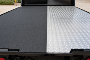 Read more about the article Spray-In Liner vs. Treadplate Deck: Which Flatbed Surface Wins?