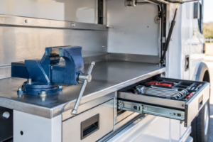 Read more about the article Vise Mount vs. Tool Tray on a Service Body Workbench: Which Setup Fits Your Trade?